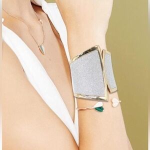 ASYMMETRICAL BANGLE HINGED SILVER AND GOLD TONE SPARKLING BRACELET